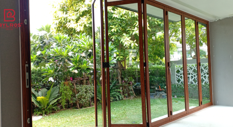 Coastal home with large aluminum-glass windows overlooking the ocean