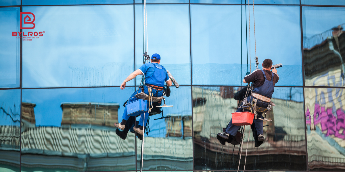 Low-E coated glass facade reducing solar heat gain in a hot climate.