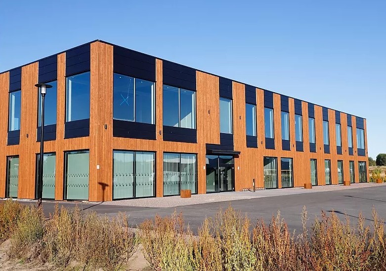 Office building before and after BYLROS glass facade installation